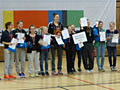 Am Ende doch noch strahlende Gesichter: Die Basketball-Mädchen vom EMG feiern ihren dritten Platz 